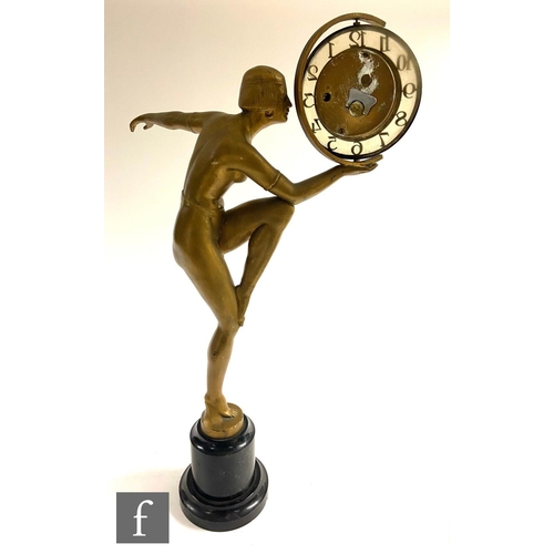 543 - Unknown - A 1930s Art Deco gilt metal model of a scantily clad female dancer with bobbed hair and st... 