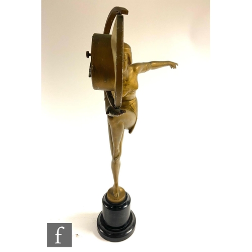 543 - Unknown - A 1930s Art Deco gilt metal model of a scantily clad female dancer with bobbed hair and st... 