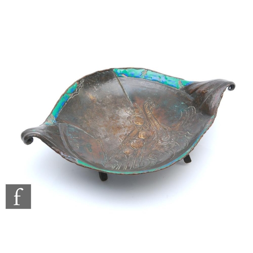 23 - Loys Lucha of Paris - A patinated metal and enamel trinket dish, circa 1910-30, raised on tripod sup... 