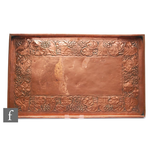 41 - Unknown - An Arts & Crafts copper tray, of rectangular form with folded rim, the interior field ... 