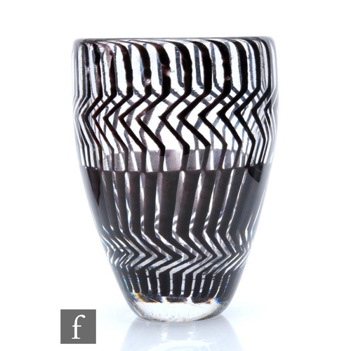 1193 - JR Burton - A studio glass graal vase of ovoid form, internally decorated with a repeat pattern of v... 