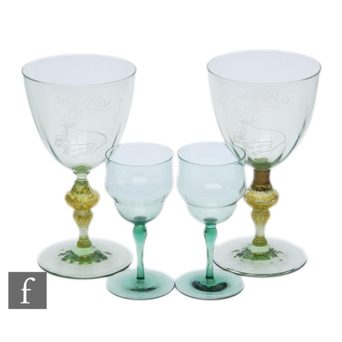 36 - Harry Powell - James Powell and Sons (Whitefriars) - A pair of goblets, each with optic ribbed cup b... 