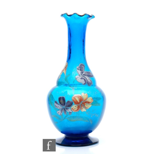 17 - In the manner of Mont Joye & Cie - An early 20th Century glass vase of footed ovoid form with ta... 