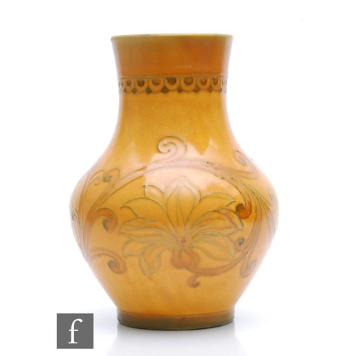 203 - William Moorcroft - A baluster vase decorated with a tubeline variant of the Spanish pattern, the wh... 