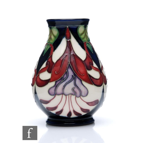 267 - Rachel Bishop - Moorcroft Pottery - A small boxed baluster vase decorated in the Bishop's Beauty pat... 