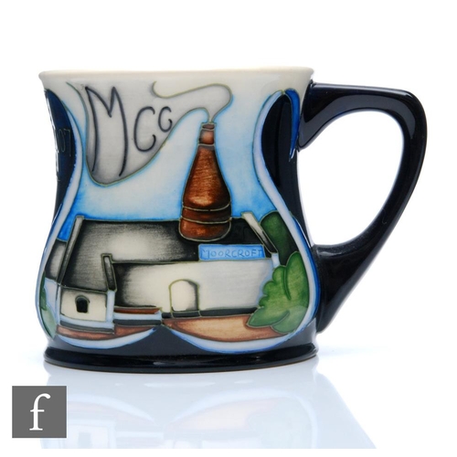 269 - Moorcroft Pottery - Two boxed mugs, the first designed by Sian Leeper to celebrate twenty years of t... 