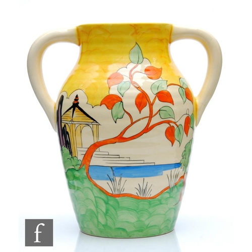 298 - Clarice Cliff - Yellow Japan - A twin handled Lotus Jug (Isis size) circa 1934, hand painted with a ... 