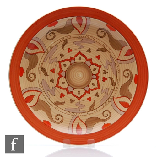 357 - Clarice Cliff - Persian - A large circular ribbed plate circa 1938, hand painted with a radial abstr... 