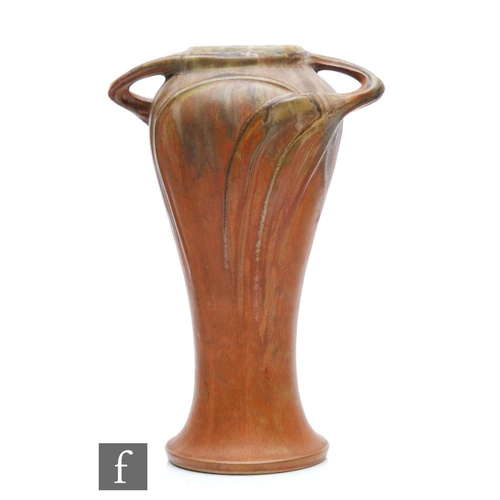 12 - Denbac - An early 20th Century French Art Nouveau twin handled vase, the whiplash handles running fr... 