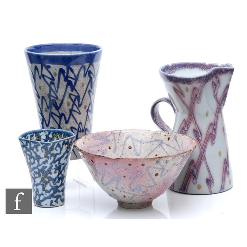 1200 - Janice Tchalenko - Dartington Pottery - Four pieces of studio pottery comprising a vase and pitcher ... 