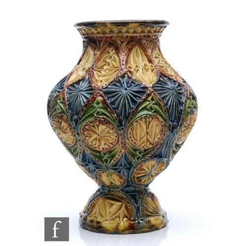 35 - Unknown - An early 20th Century vase of ovoid form with a flared foot profusely decorated with carve... 