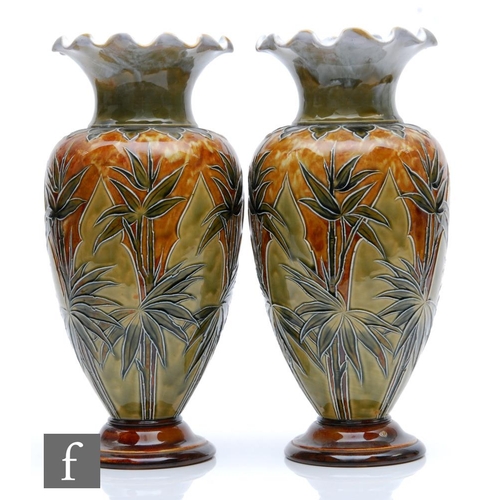 48 - Eliza Simmance - Doulton Lambeth - A pair of large vases decorated with tubelined bamboo shoots in t... 