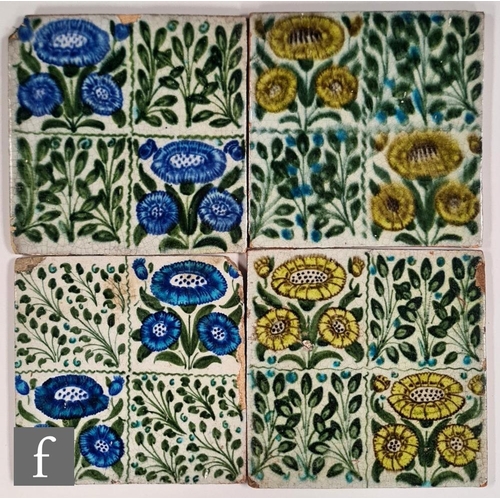 54 - William de Morgan - Merton Abbey - Four 6 inch tiles decorated in the Bedford Park Daisy pattern com... 