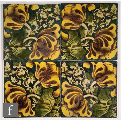 62 - Lewis Day - Maw and Co - Four 6 inch plastic clay tiles each decorated with two yellow flowers and f... 