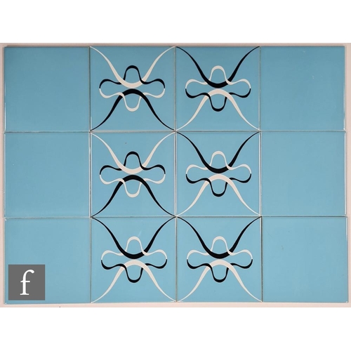 63 - Pilkingtons - Twelve 1950s 6 inch dust pressed tiles comprising six tiles with a black and white Int... 