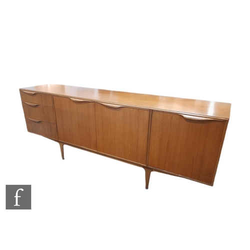 878 - Tom Robertson - McIntosh of Kirkcaldy - A teak Dunvegan sideboard, fitted with a central double door... 