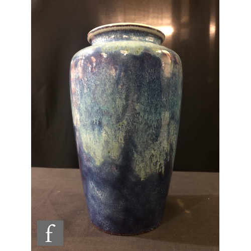 88 - Ruskin Pottery - A high fired vase of shouldered form decorated with a sweeping lavender and ice blu... 