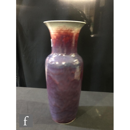 123 - Ruskin Pottery - A large high fired vase of high shouldered form with a flared neck decorated in a s... 