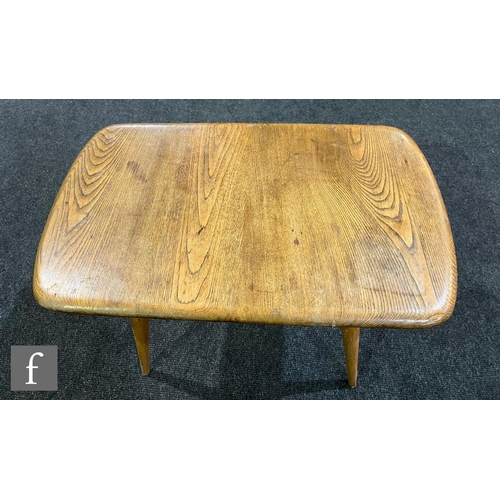 868 - Lucian Ercolani for Ercol Furniture - A model 213 occasional table, with rounded rectangular elm top... 