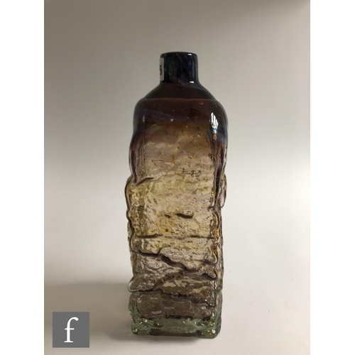 925 - Michael Harris - Mdina - A large textured form bottle vase circa 1970, of rectangular section with r... 