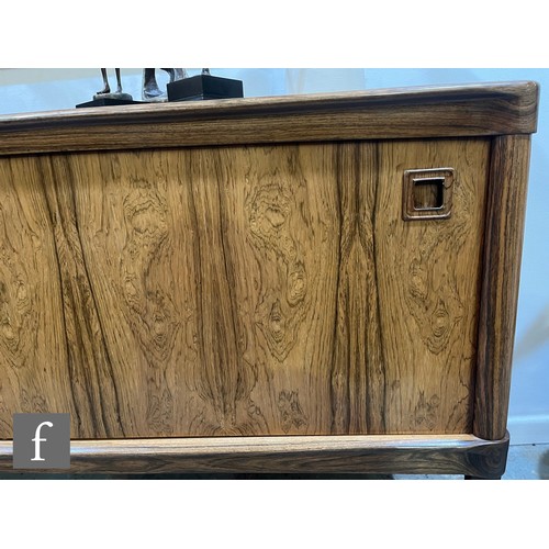 845 - H.W. Klein - Bramin Mobler, Denmark - A rosewood veneered sideboard, fitted with a central bank of f... 