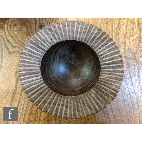 1368 - Mike Wilson - A group of contemporary wooden bowls to include a large blackened cedar, a medium wild... 