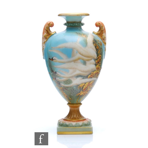 57 - An early 20th Century Royal Worcester shape 2120 pedestal vase decorated by Charlie Baldwyn with fou... 