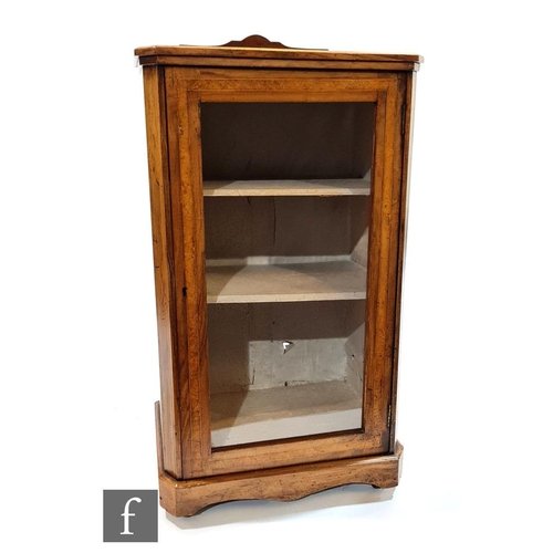 1055 - A Victorian walnut pier cabinet, the shelf interior enclosed by a glazed door, height 92cm x depth 3... 