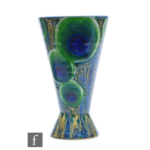 116 - A Janice Tchalenko for Dartington Pottery vase of footed conical form, decorated in the Peacock Feat... 