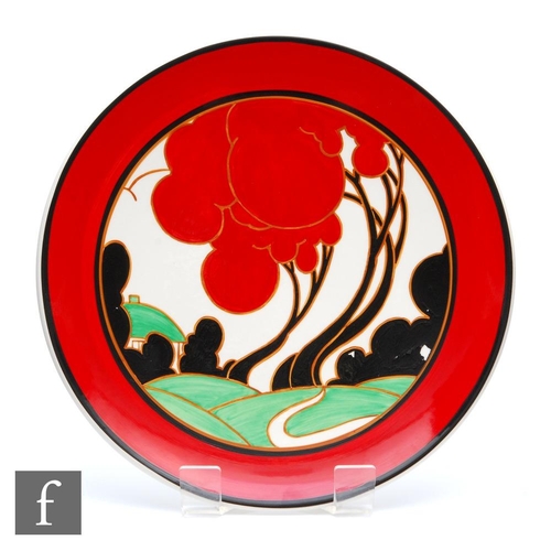 120 - A boxed Wedgwood Clarice Cliff hand painted charger decorated in the Red Autumn pattern, number 6 in... 