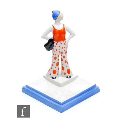 124 - A boxed Wedgwood Clarice Cliff hand painted Lido Lady in orange from 1931, number 18 in a limited ed... 