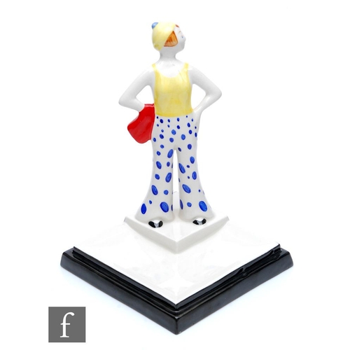 126 - A boxed Wedgwood Clarice Cliff hand painted Lido Lady in blue from 1931, number 18 in a limited edit... 