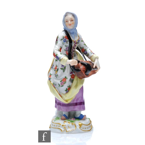 141 - A 19th Century Meissen Street Trader figure from the Cris de Paris series modelled as the Hurdy Gurd... 