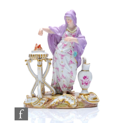 146 - A 19th Century Meissen allegorical figure modelled as Winter making fire, modelled as a lady draped ... 