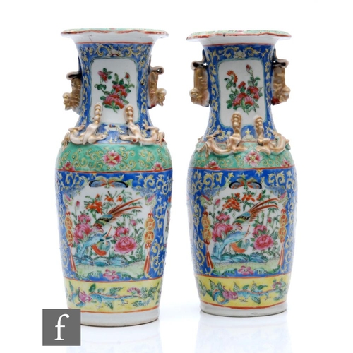 174 - A pair of late 19th Century Chinese Famille rose vases, each of ovoid form rising to a slender neck ... 