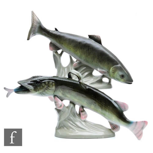 40 - Two Royal Dux models of a fish, the first a relative of the salmon, the second a pike with a smaller... 