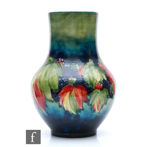 45 - A large Moorcroft vase of globe and shaft form decorated in the Leaf and Blackberry pattern, impress... 