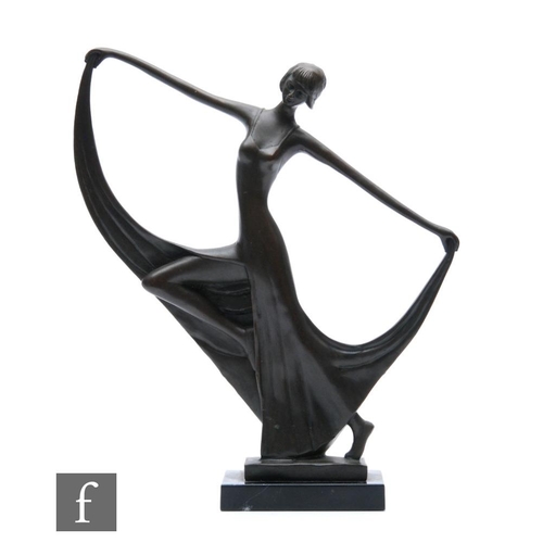 486 - An Art Deco style bronze figure of a female dancer, raised on a black marble base, height 33cm.