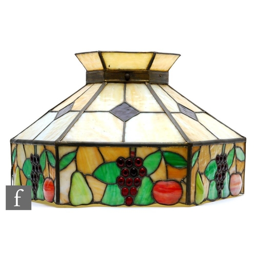 495 - A large Tiffany style leaded and coloured panelled ceiling light shade, decorated with a border of g... 