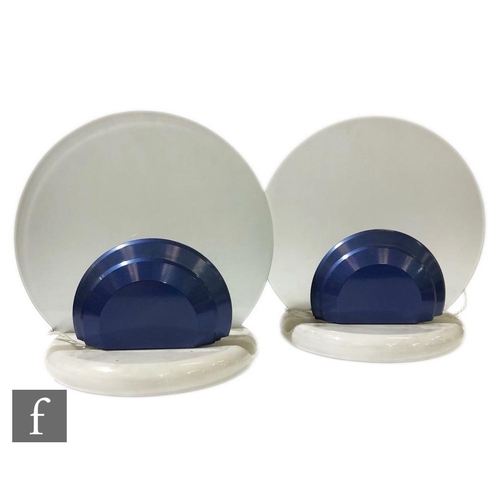 514 - A pair of Art Deco style table lamps, the circular marble base with blue circular decoration before ... 