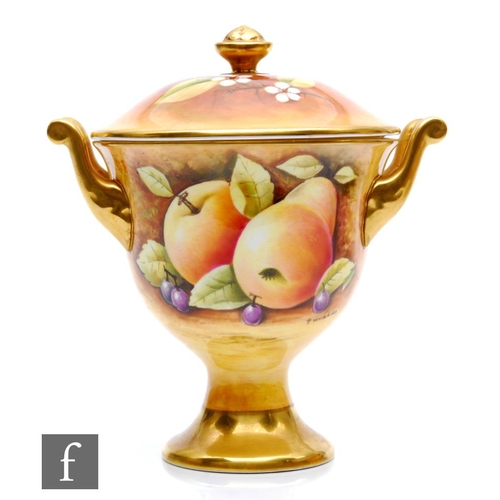 52 - A Coalport twin handled vase and cover decorated by P Worsdale with hand painted apples, pears and r... 