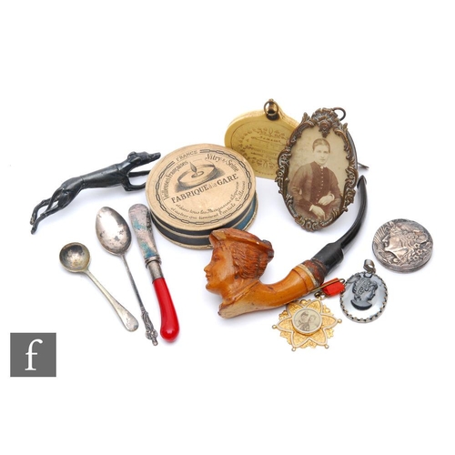 532 - A 19th century Meerschaum pipe and various collectors items to include an Elite appointment register... 