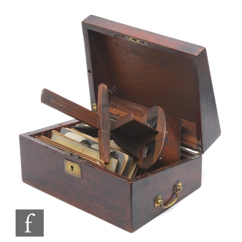 536 - An Edwardian Stereoscopic viewer and a quantity of cards, to include social history, Canada, views e... 