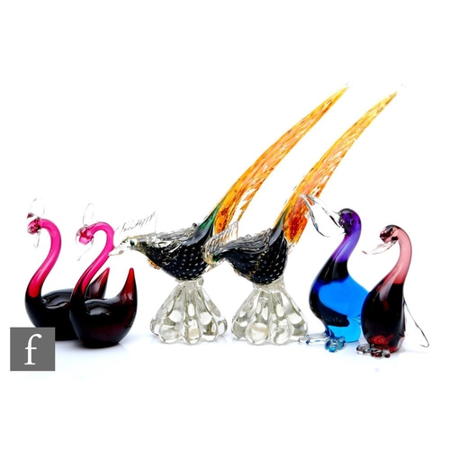 567 - A pair of 20th Century Murano glass figures, modelled as stylised birds with elongated tails, intern... 