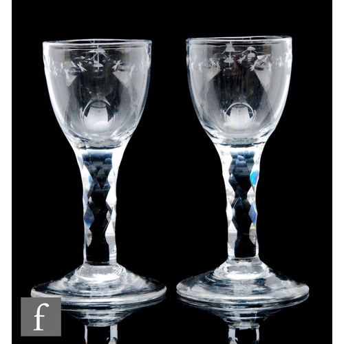 595 - A pair of 18th Century drinking glasses circa 1780, the round funnel bowl with upper swagged OXO bor... 