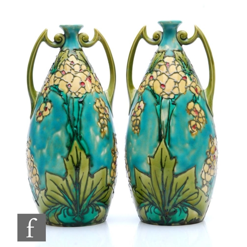 64 - A pair of early 20th Century Minton Seccessionist vases of bottle form with angular handles to the s... 