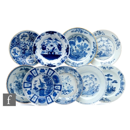 65 - Nine assorted 19th Century English and Chinese tin glazed Delft plates, each with a hand painted chi... 