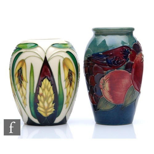 69 - Two small Moorcroft Pottery vases, the first decorated in the Finches pattern, the second of ovoid f... 