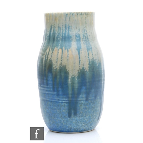 7 - A Ruskin Pottery crystalline vase decorated with a dribble blue over cream with crystalline flecks, ... 