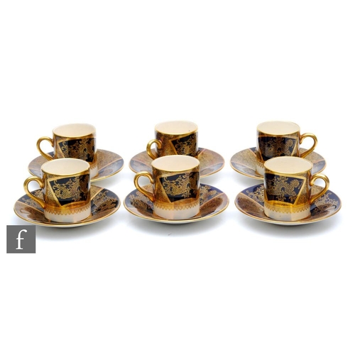 70 - A boxed Soho Pottery Ambassador Ware set of six coffee cans and saucers each decorated with a royal ... 